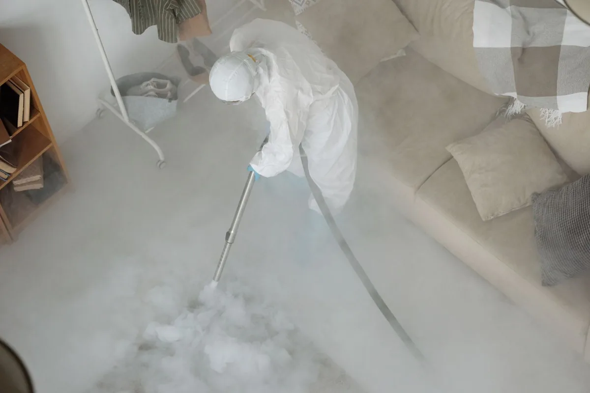 Biohazard cleanup technician in protective equipment, Chalfont, PA